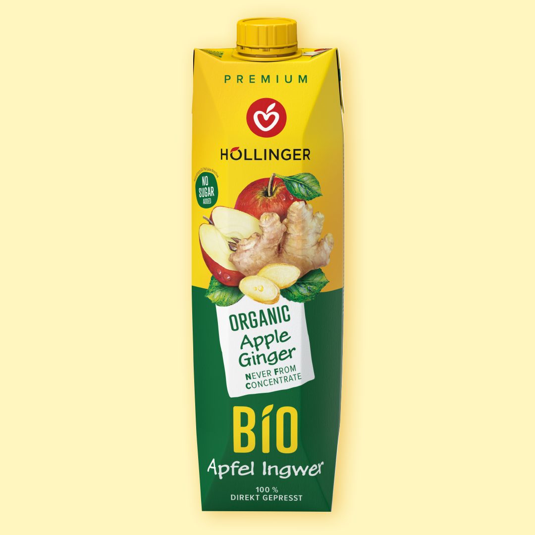 Höllinger Bio Apfel-Ingwersaft Tetrapak in gelb und grün mit einem frischen Apfel sowie einer Ingwerknolle.